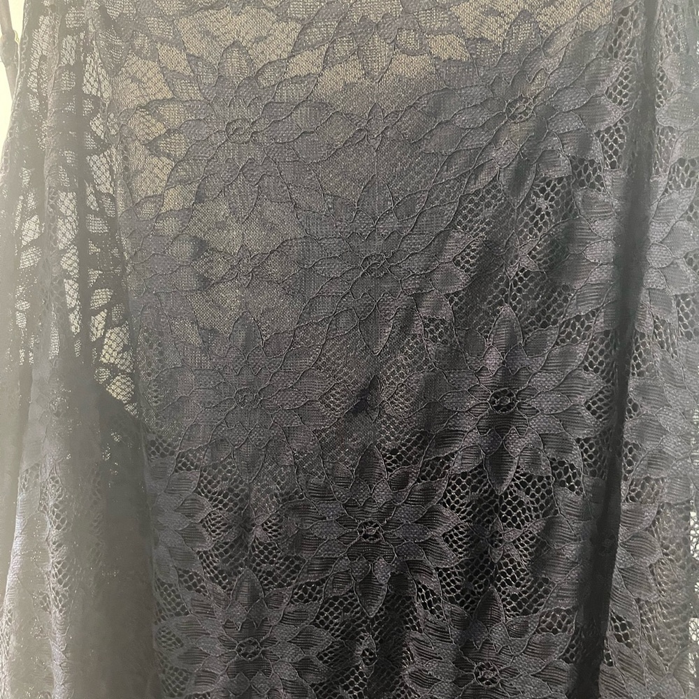 Black lacy slip dress from urban outfitters never worn tags still on size L